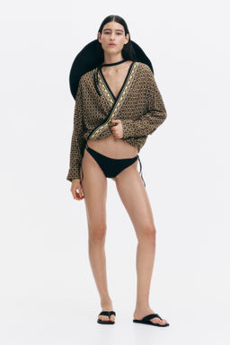 Blusa de viscosa con dise?o cruzado - H&m фото 5