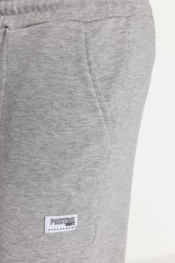 TRENDYOL MAN Ekru Regular Fit Etiket Aplikeli Cepleri Dikisli Esofman Alt? TMNSS23EA00010 - Trendyolmilla фото 9