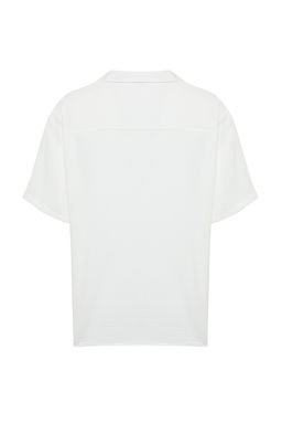 Beyaz Oversize Fit Yazl?k K?sa Kollu Keten Gorunumlu Gomlek TMNSS24GO00019