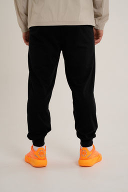 Брюки трикотажные Черный BASKETBALL Knit Track Pants - Anta фото 5