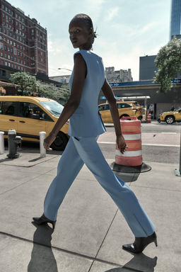 FLARE TROUSERS WITH SIDE VENTS