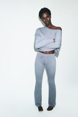 WASHED-EFFECT FLARE TROUSERS