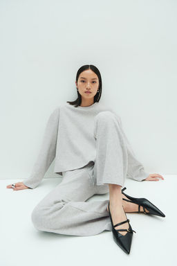 Leggings acampanados en punto fino