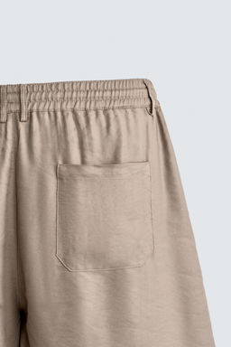 PANTAL?N FLUIDO RELAXED FIT / rosa claro
