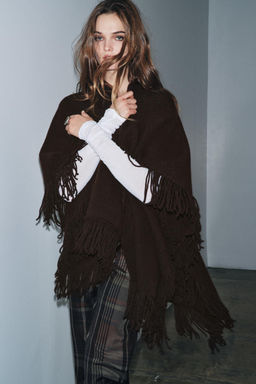 FRINGED KNIT CAPE