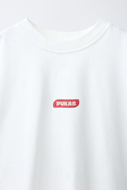 CAMISETA FOTOGRAF?A PUKAS SURF / Blanco