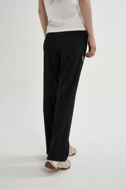 Брюки трикотажные Черный ANTA ICONIC Knit Track Pants  фото 5