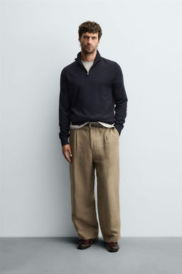 100% WOOL QUARTER-ZIP SWEATER