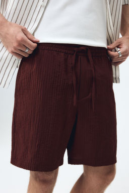 Pantal?n corto texturizado Relaxed Fit - H&m фото 8