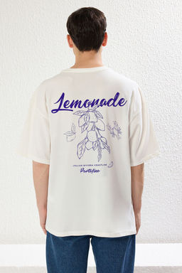 TRENDYOL MAN Beyaz Oversize/Genis Kesim Limon Bask?l? %100 Pamuklu T-Shirt TMNSS23TS00089