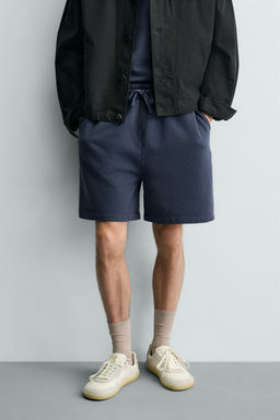 BERMUDA JOGGER B?SICA LAVADA / Azul?n