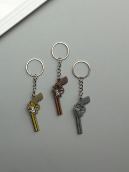 Цена за 12 шт. Брелок металл "Револьвер" крутится барабан МИКС 5,8х2,8х0,9 см