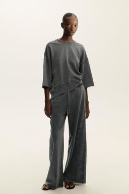 WASHED EFFECT TROUSERS
