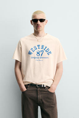 CAMISETA RELAXED FIT TEXTO LAVADO / Blanco