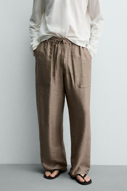 PANTAL?N FLUIDO RELAXED FIT / rosa claro