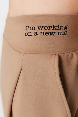 TRENDYOLMILLA Siyah Bask? Detayl? Wide Leg/Rahat Kesim Asimetrik Bel Orme Pantolon TWOAW23PL00389 фото 3