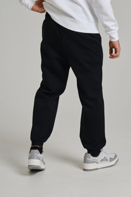 Брюки трикотажные утепленные Черный CAMPUS Knit Track Pants - Anta фото 6