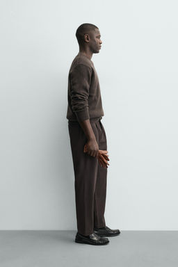 PLEATED TEXTURED TROUSERS