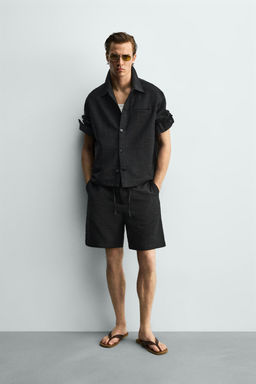BERMUDA FLUIDA RELAXED FIT / Negro