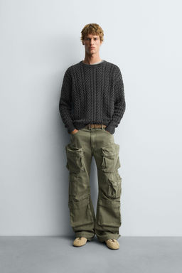 WASHED CABLE-KNIT SWEATER