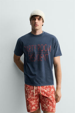 CAMISETA TEXTO EFECTO LAVADO / Azul