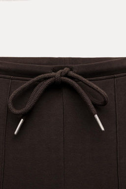 STITCHED INTERLOCK BELL BOTTOM TROUSERS - Zara фото 25