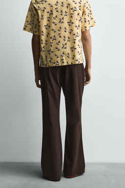 FLARE FIT TROUSERS HARRY LAMBERT FOR ZARA X DISNEY  фото 3