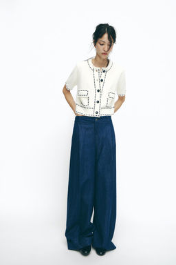 SHORT SLEEVE STITCHED KNIT JACKET