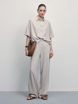 Льняные брюки с эластичным поясом / Zarina