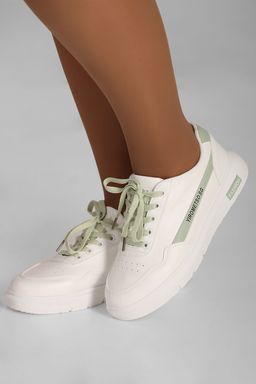 Кроссовки белые с зелеными шнурками