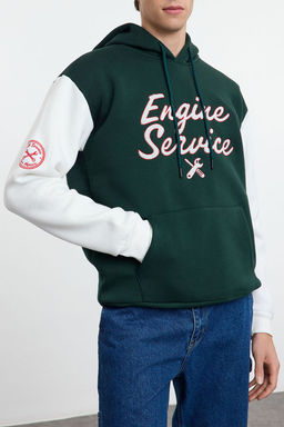Zumrut Yesili Oversize/Genis Kesim Nak?sl? Renk Bloklu Kapusonlu Ici Polar Sweatshirt TMNAW25SW00044