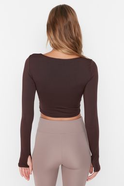 Koyu Kahverengi Crop Pencere/Cut Out ve Bas Parmak Delik Detayl? Orme Spor Ust/Bluz TWOAW21BZ0156