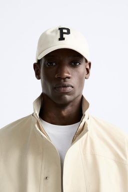 CAP WITH LETTER PATCH