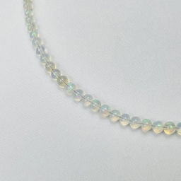 Колье на увеличение из Опала