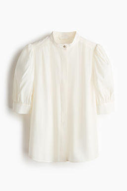 Blusa con mangas abullonadas