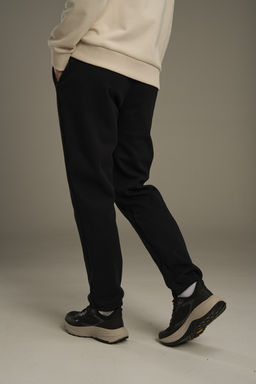 Брюки трикотажные утепленные Черный ANTA TRN Knit Track Pants фото 6