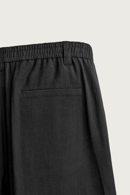 PANTAL?N FLUIDO PLIEGUES LATERALES / Negro - Zara фото 14