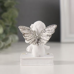 Цена за 2 шт. Фигурка полистоун «Ангелочек на книге с серебристыми крыльями», стразы, 4×4.5×6.5 см, МИКС