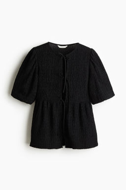 Top de anudar con peplum