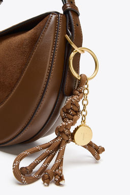 CORD CHARM