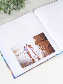 Фотоальбом на 80 фото 10х15 см "Мальчик с мишкой и пузырьки" в коробке 5х19х22,8 см