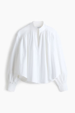 Blusa fruncida en popelina