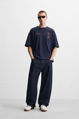 T-SHIRT WITH CONTRAST PRINTS