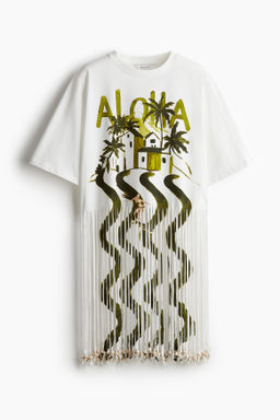 Vestido camiseta con flecos