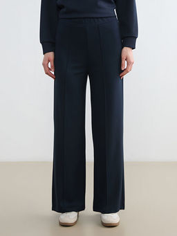 Kad?n Beli Lastikli Geni? Pa?a E?ofman Alt?