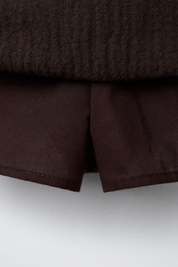 RUFFLED POCKET BERMUDA SKORT