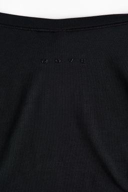 Top de deporte cruzado en modal - H&m фото 12