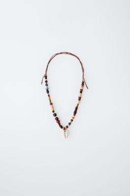 COLLAR ABALORIOS Y CONCHA / Marr?n