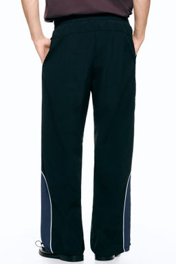 Pantal?n de ch?ndal en nailon Loose Fit - H&m фото 3