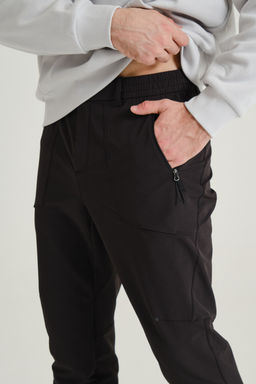 Брюки текстильные GUANJUN Черный - Anta фото 3